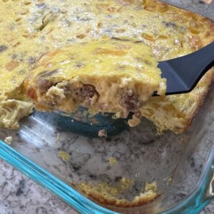 slice of crustless quiche with peppers, cheese, and sausage