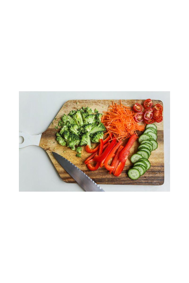 food on cutting board with knife